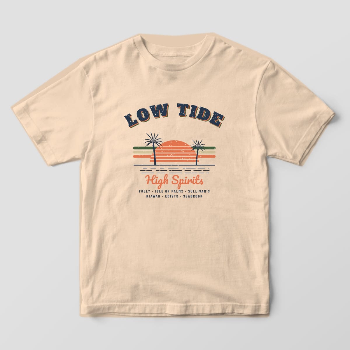 Front of an ivory Comfort Colors 1717 tee with a large retro Low Tide High Spirits sunset print