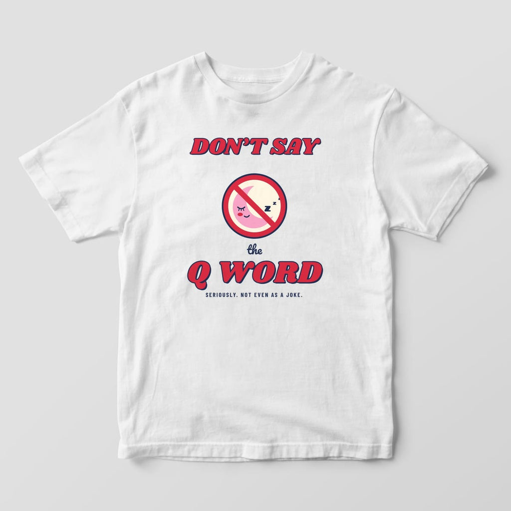 Front of a white Comfort Colors 1717 tee with a full-front Don't Say the Q Word print and a sleeping moon in a no sign