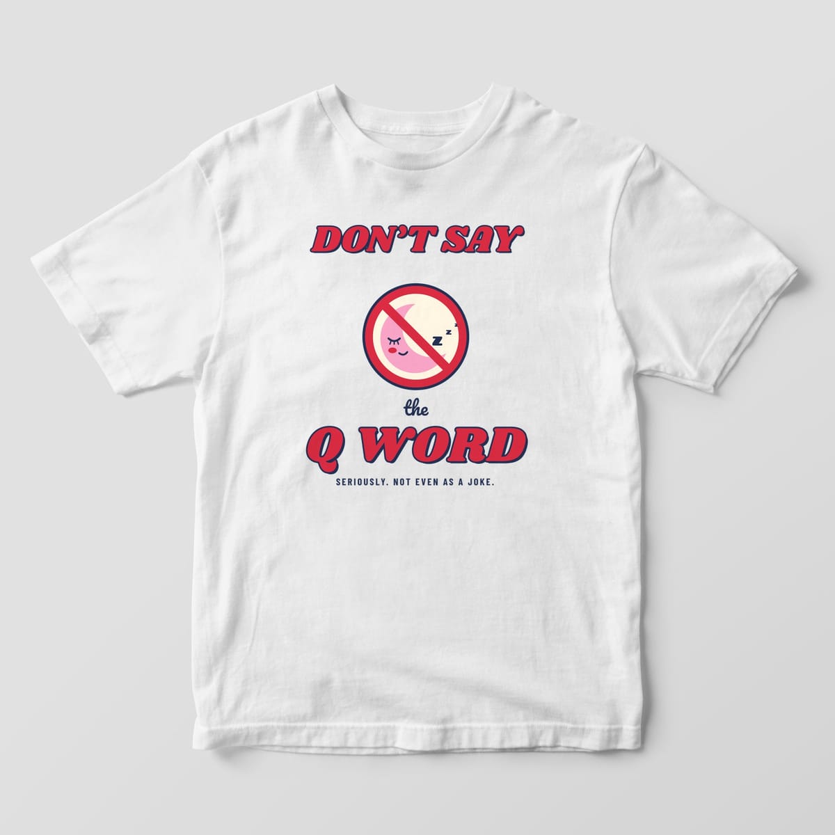 Front of a white Comfort Colors 1717 tee with a full-front Don't Say the Q Word print and a sleeping moon in a no sign