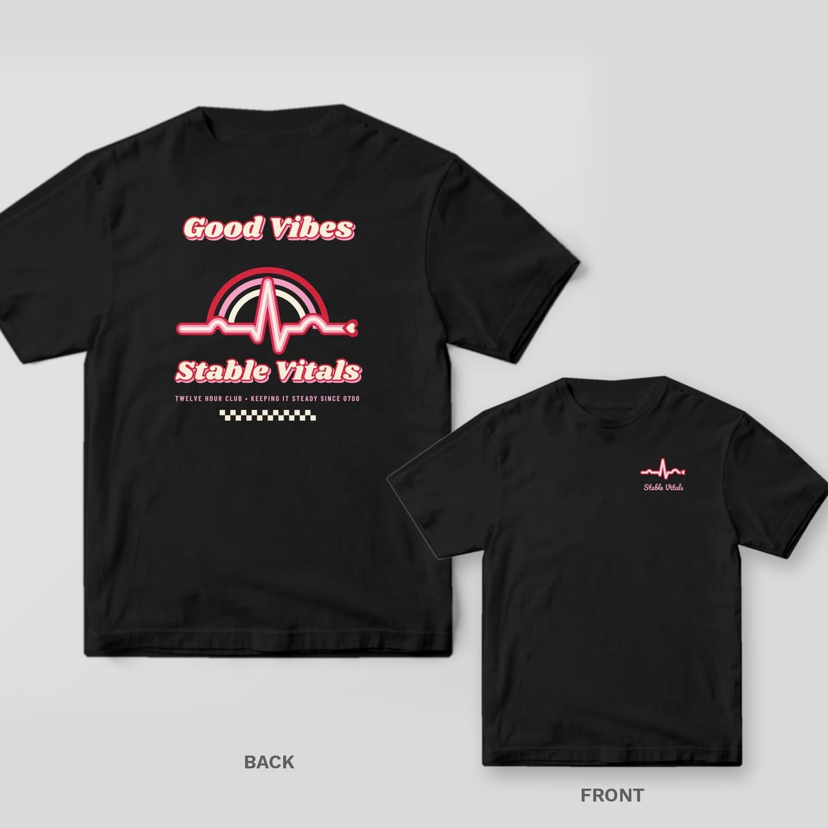 Black Comfort Colors tee shown back and front: groovy Good Vibes Stable Vitals rainbow heartbeat back print and a small heartbeat on the left chest