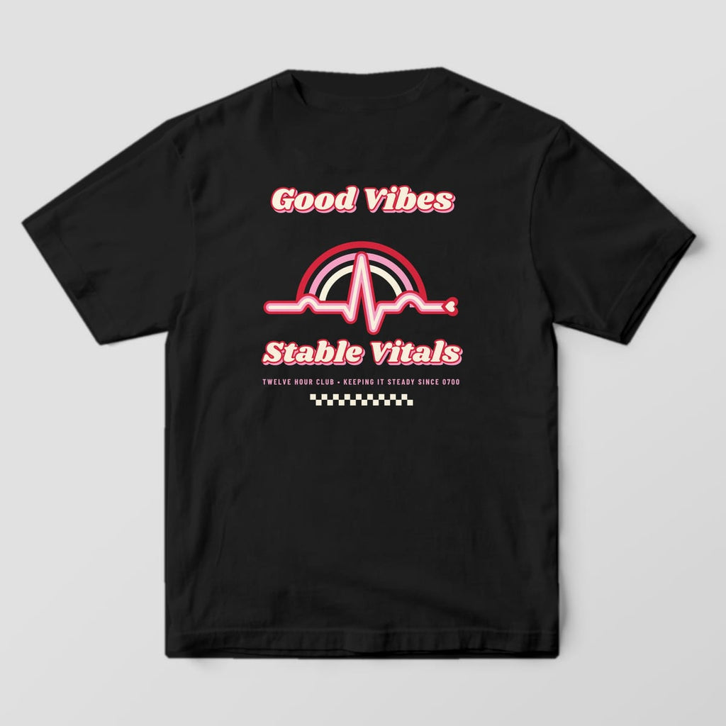 Back of a black Comfort Colors 1717 tee with a 70s rainbow and striped heartbeat line between Good Vibes and Stable Vitals