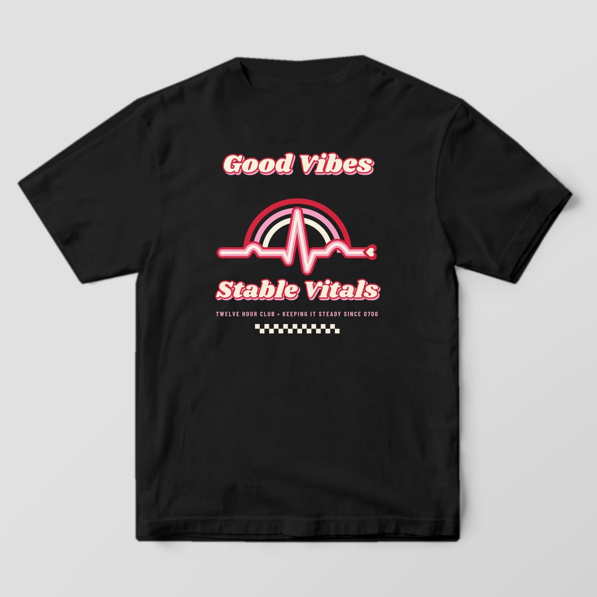 Back of a black Comfort Colors 1717 tee with a 70s rainbow and striped heartbeat line between Good Vibes and Stable Vitals
