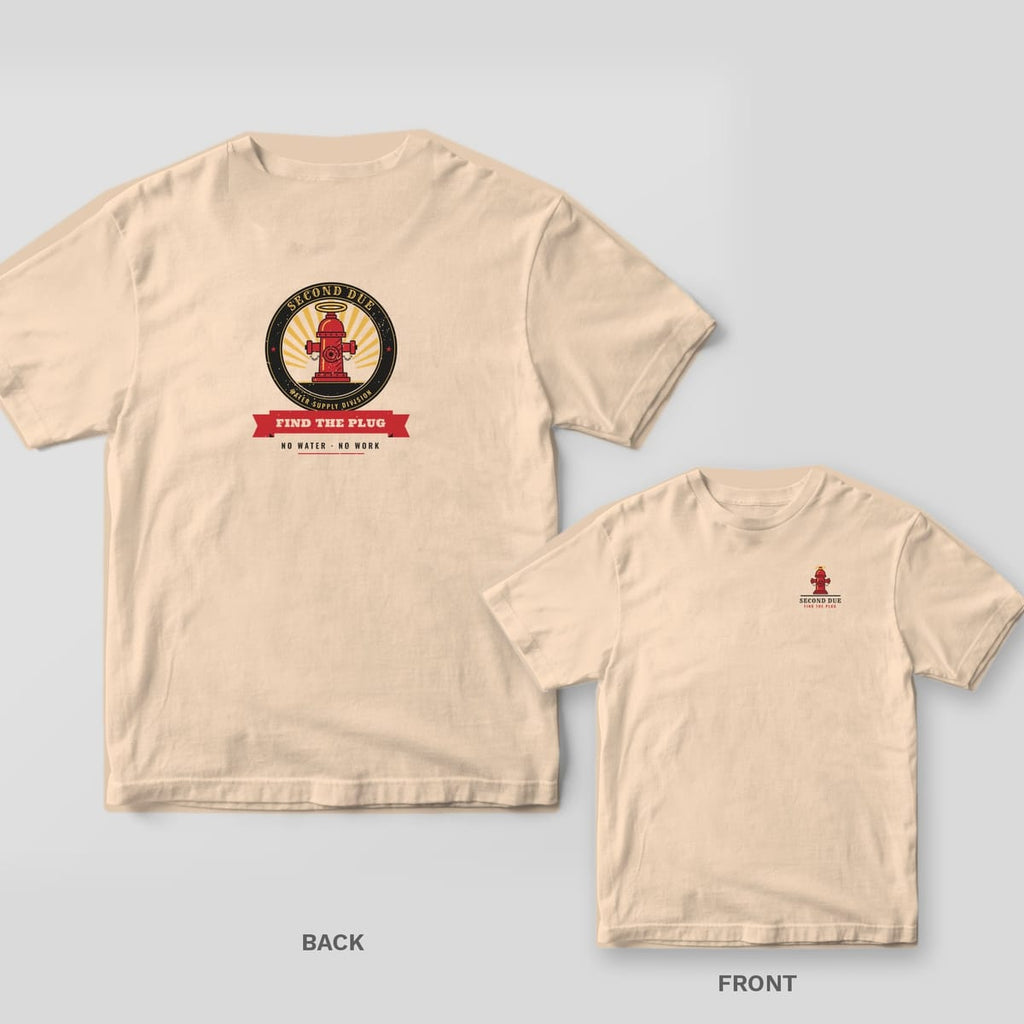 Ivory tee with a round badge showing a haloed red fire hydrant and a Find the Plug banner on the back, small hydrant on the front chest