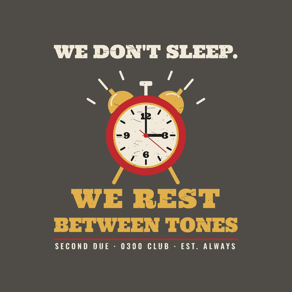 Close-up of the alarm clock print showing the clock face, bells and bold gold lettering