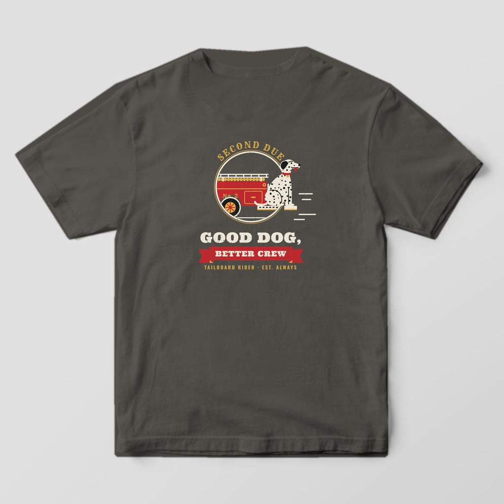 Back of a pepper Comfort Colors tee with a dalmatian on a fire engine tailboard and the text Good Dog, Better Crew