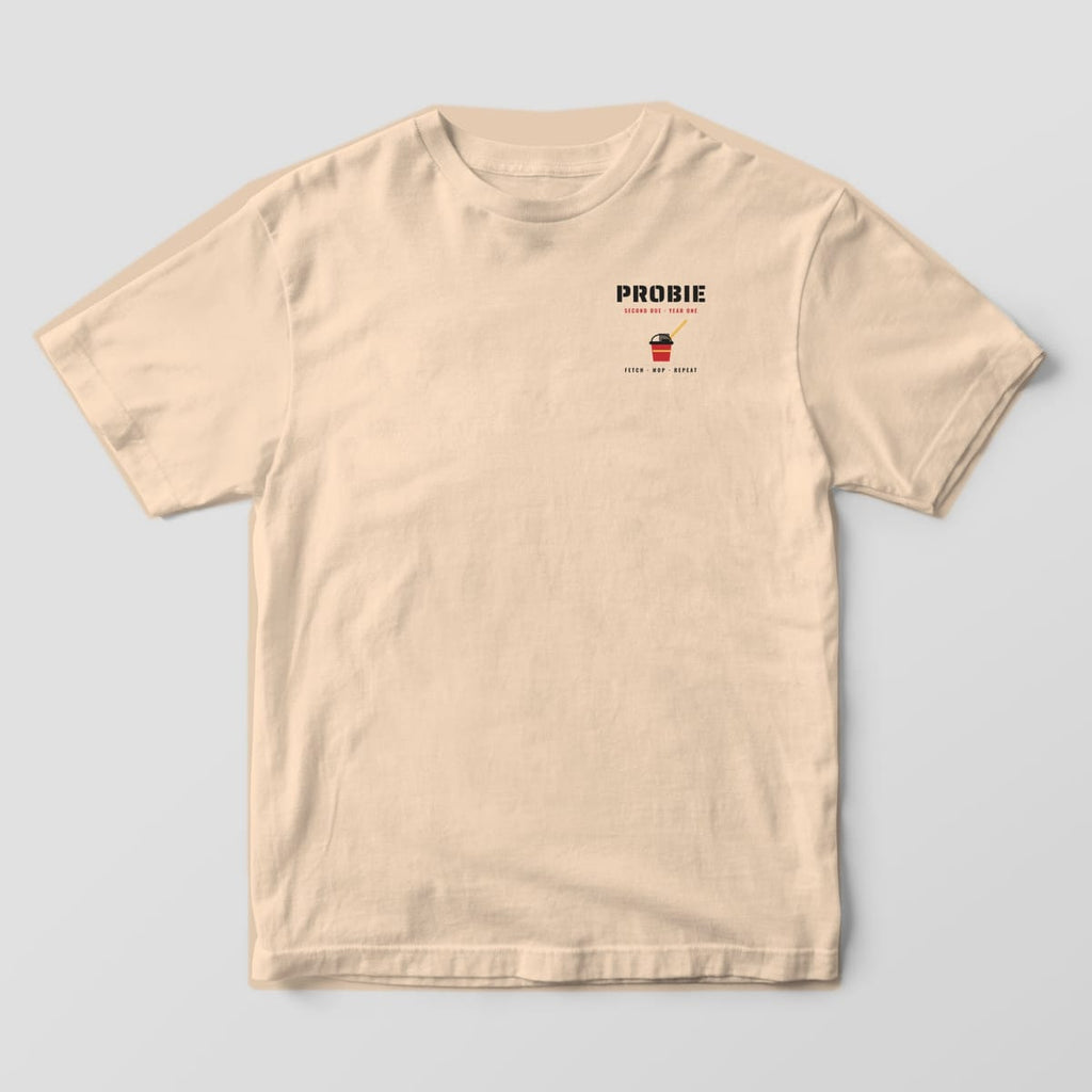 Front of an ivory Comfort Colors tee with Probie in stencil letters and a small red mop bucket on the left chest