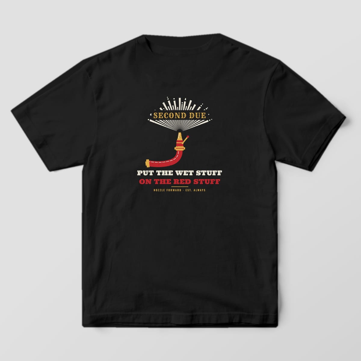 Back of a black Comfort Colors tee with a brass nozzle, red hose, water spray fan and the wet stuff on the red stuff text