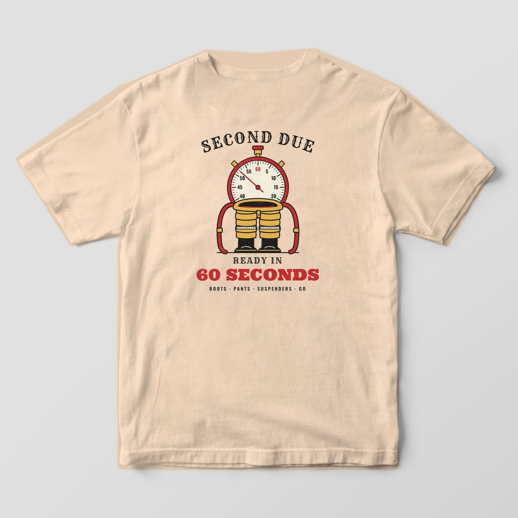 Back of an ivory Comfort Colors tee with tan bunker pants, black boots, red suspenders and a stopwatch, Ready in 60 Seconds