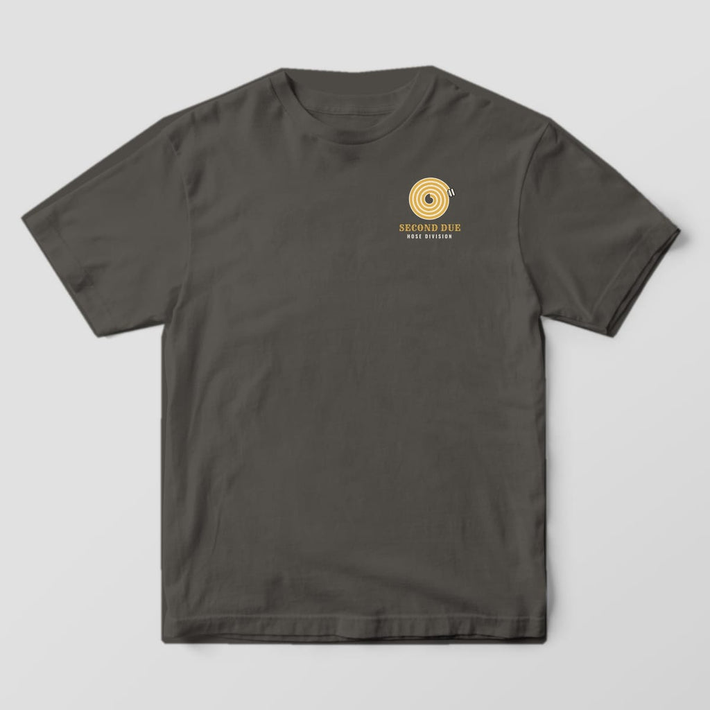 Front of a pepper Comfort Colors tee with a small rolled fire hose and Second Due Hose Division on the left chest
