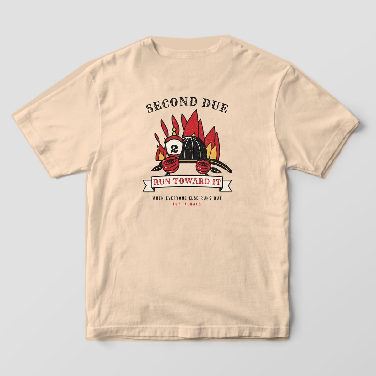 Back of an ivory Comfort Colors tee with a black fire helmet, red roses and flames in traditional tattoo style with a Run Toward It banner