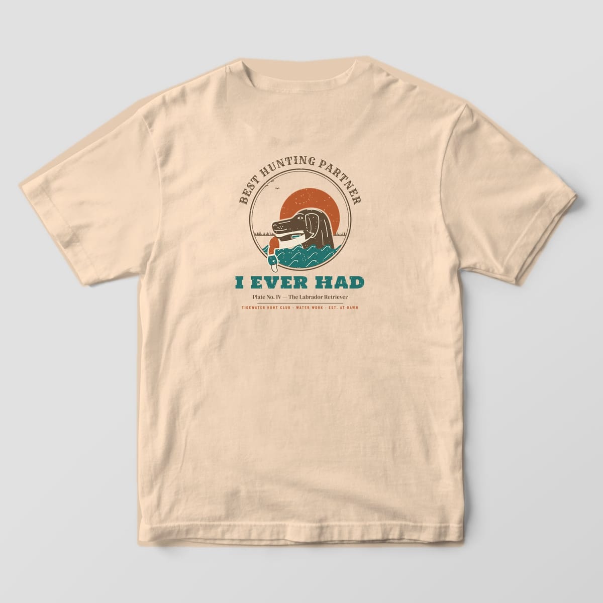 Back print on a Ivory Comfort Colors 1717 tee: Round plate of a chocolate Labrador retrieving a mallard drake through curling teal waves under a rust sun, with "Best Hunting Partner" arched above and "I Ever Had" below