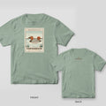 Canvasback Member Stamp duck hunting shirt shown back and front on Bay Comfort Colors 1717: perforated canvasback member stamp in brown, rust and teal