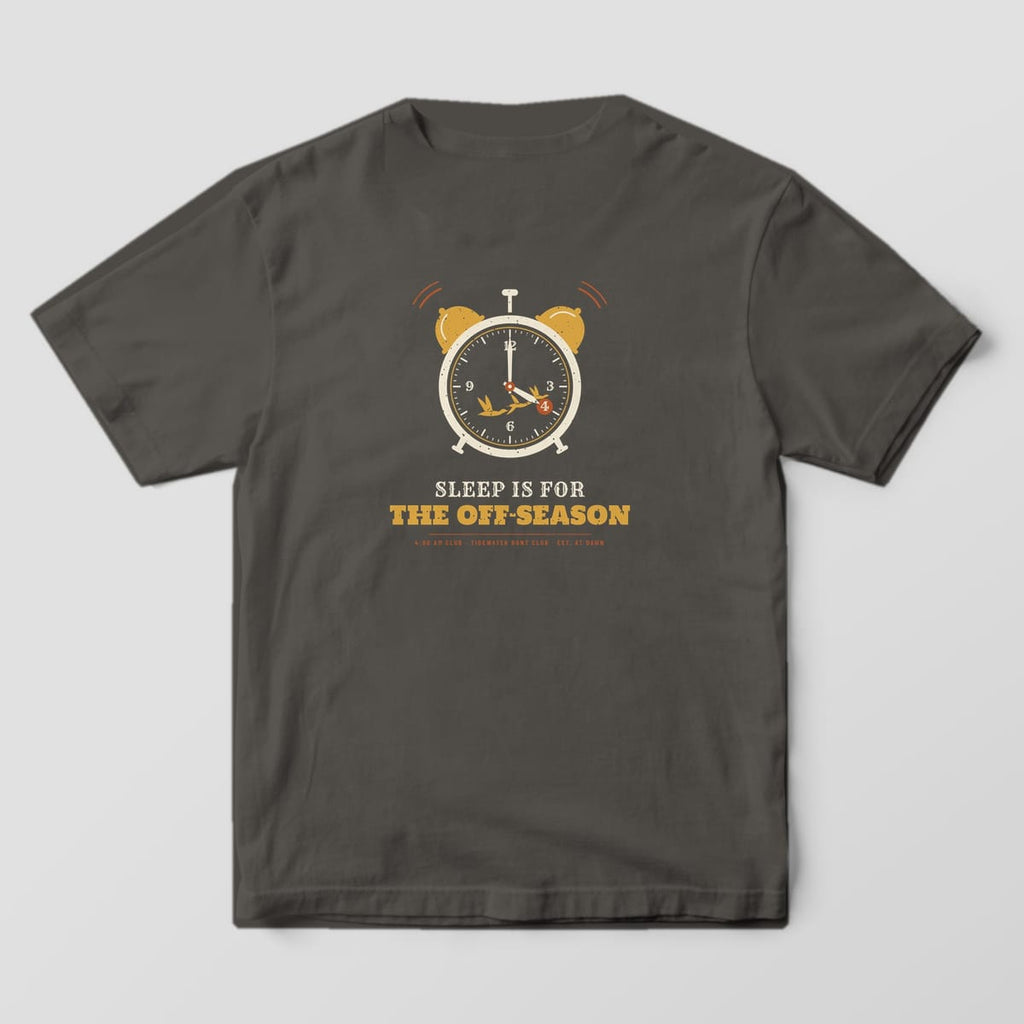 Back print on a Pepper Comfort Colors 1717 tee: Ringing twin-bell alarm clock reading 4:00 with gold ducks flying across the face, over "Sleep Is for the Off-Season" and "4:00 AM Club, Tidewater Hunt Club"