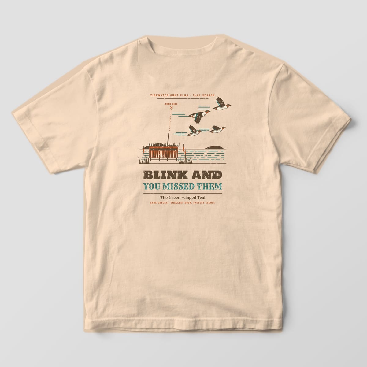 Ivory Comfort Colors T-shirt back showing teal flying past a marsh blind with the words Blink and You Missed Them