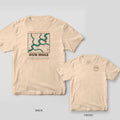 Back and front views of an ivory T-shirt with a tidal creek treasure-map style chart on the back and a round badge on the chest