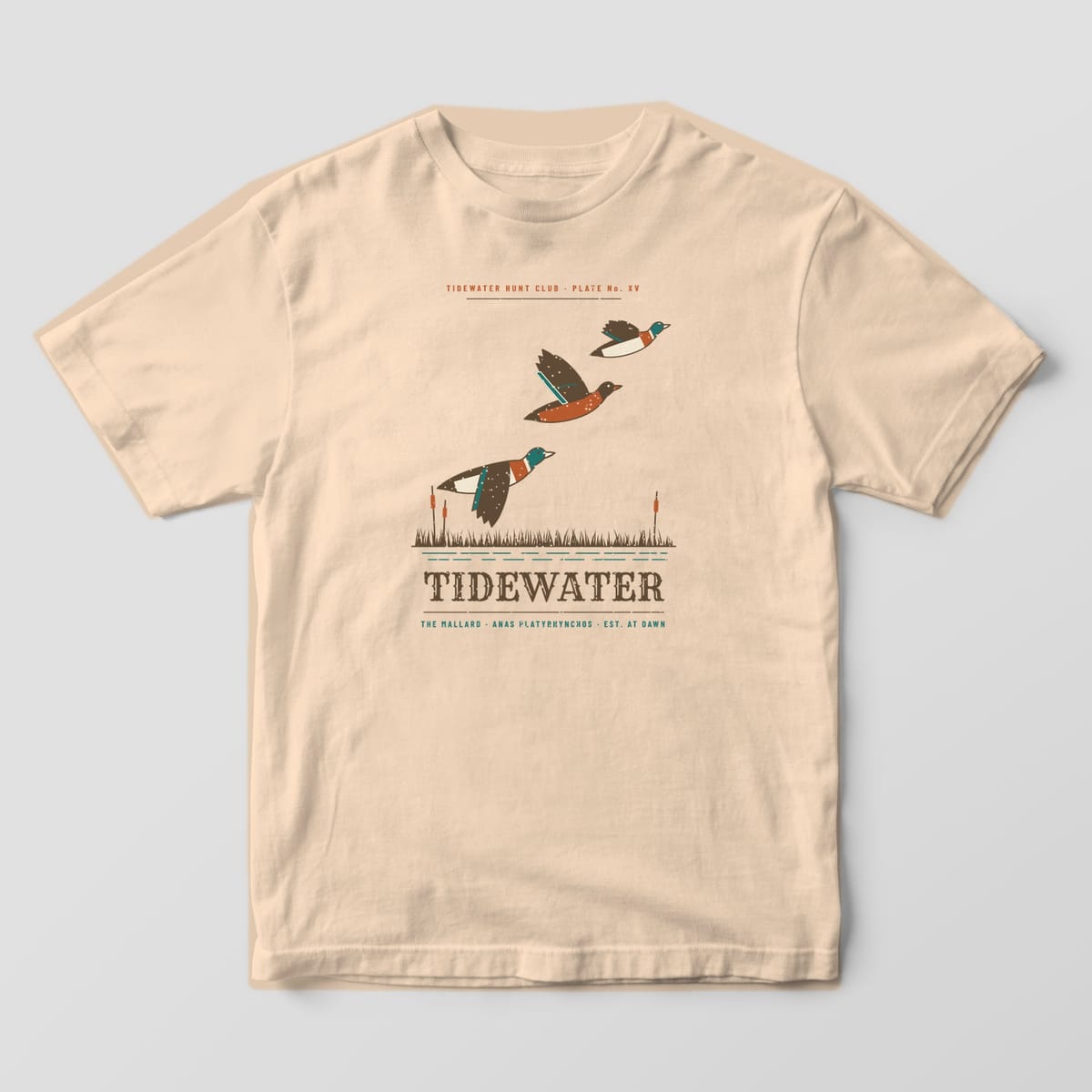 Ivory Comfort Colors T-shirt front with a full print of three mallards flying over cattails and Tidewater lettering
