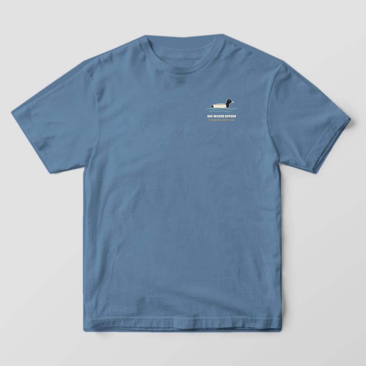 Blue Jean Comfort Colors T-shirt front with a small swimming bluebill and Big Water Divers text on the left chest