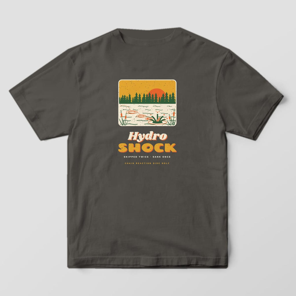 Back of a Pepper Comfort Colors 1717 tee printed with a framed retro pond scene with pines, cattails and a disc skipping into the water above the words Hydro Shock.