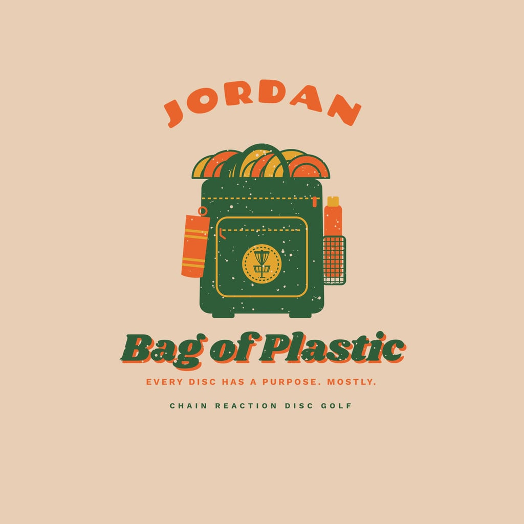 Close-up of the back print artwork: a custom name arched over a green disc golf backpack stuffed with orange and mustard discs above the words Bag of Plastic, with retro speckled texture.