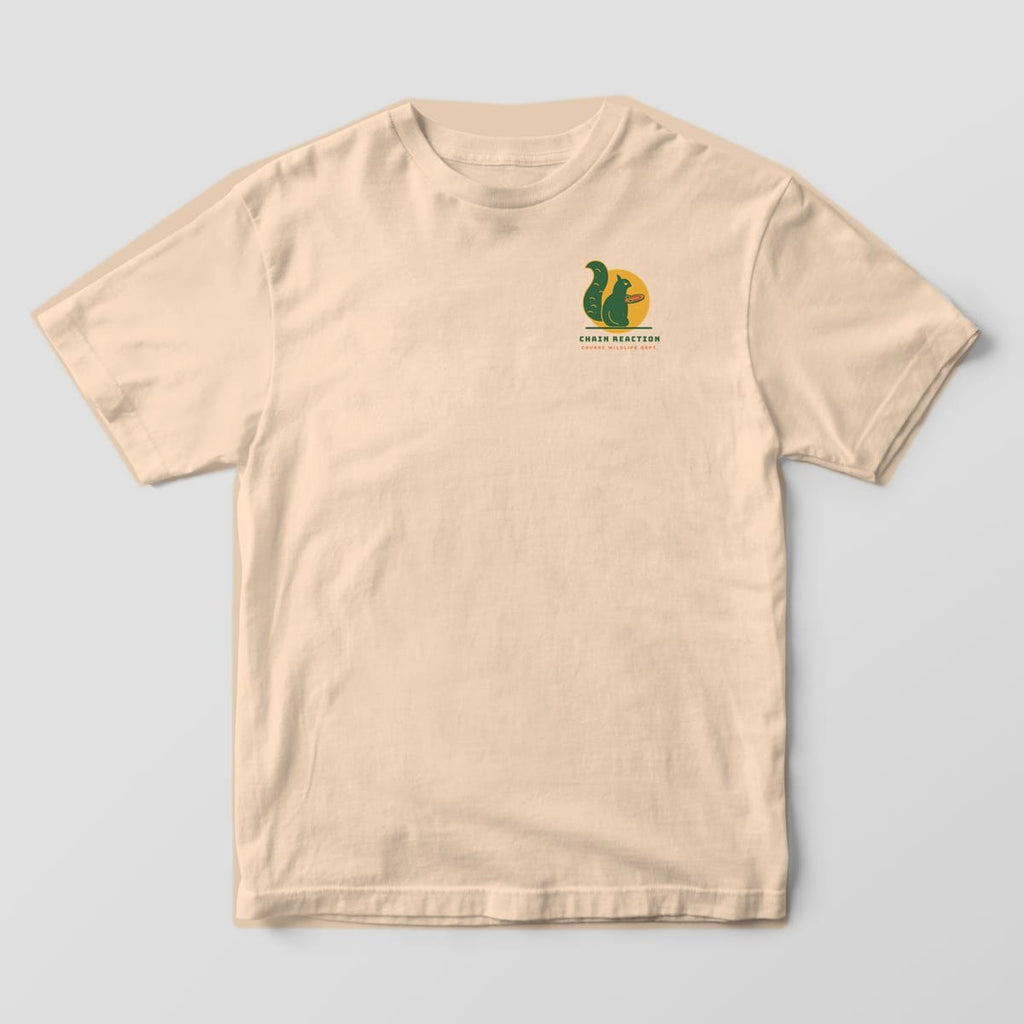 Front of an ivory Comfort Colors t-shirt with a small squirrel and sun logo on the left chest reading Chain Reaction