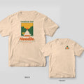 Ivory t-shirt shown back and front: tee pad view down a tunnel of green pines to a distant basket and sun, Thread the Needle lettering, small tee pad logo on chest