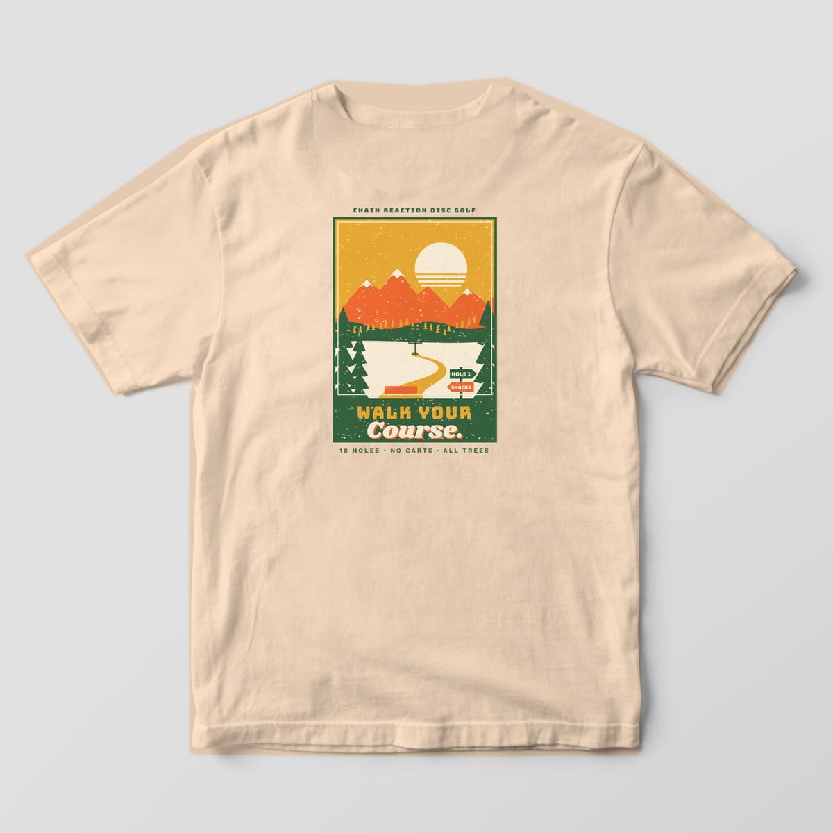 Back of an ivory Comfort Colors t-shirt with a park poster style disc golf scene titled Walk Your Course