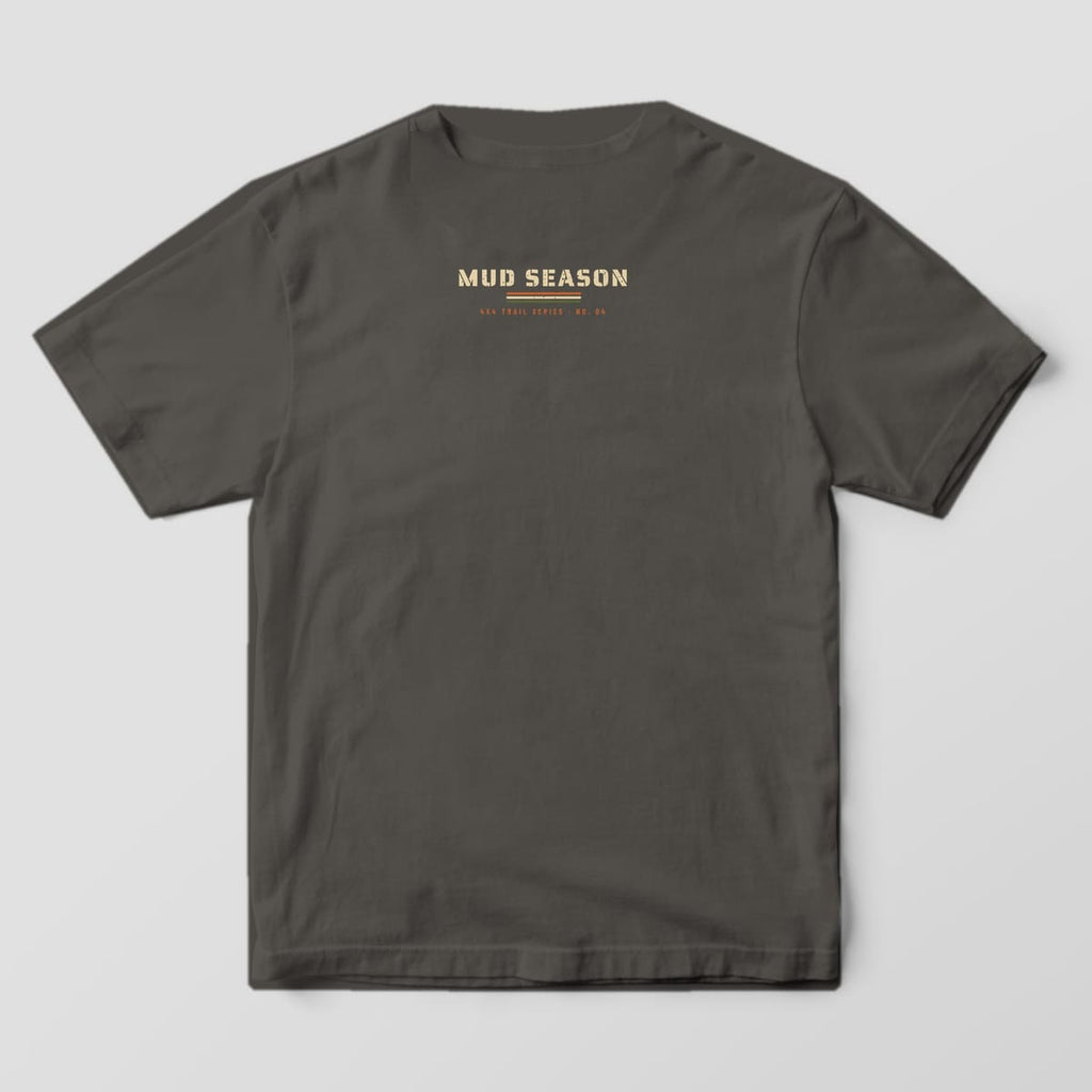 Back of a Pepper Comfort Colors 1717 tee with a small stencil Mud Season logo under the collar