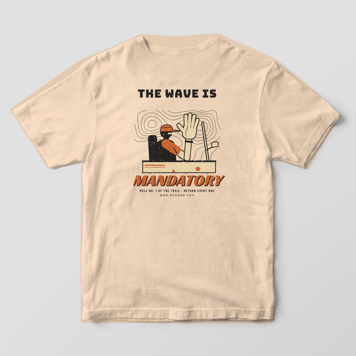 Back of an Ivory Comfort Colors 1717 tee printed with a driver waving out of a doorless rig over topo lines with The Wave Is Mandatory text