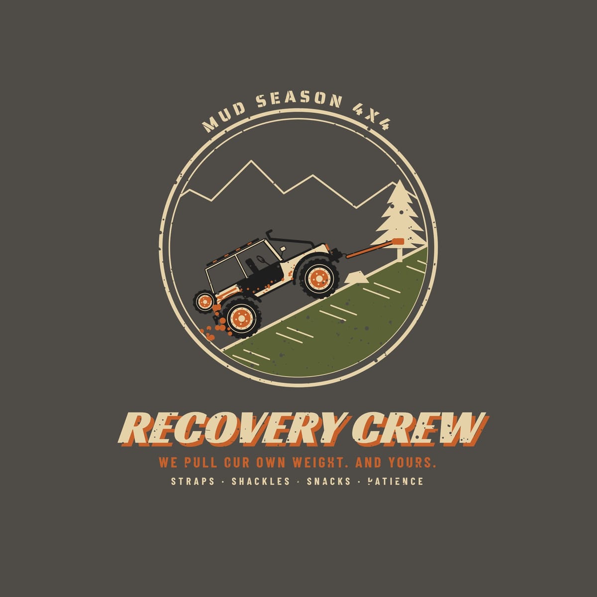 Close-up of the back print artwork, circle badge of a trail rig winching up a hill to a pine tree with Recovery Crew text, on a pepper background