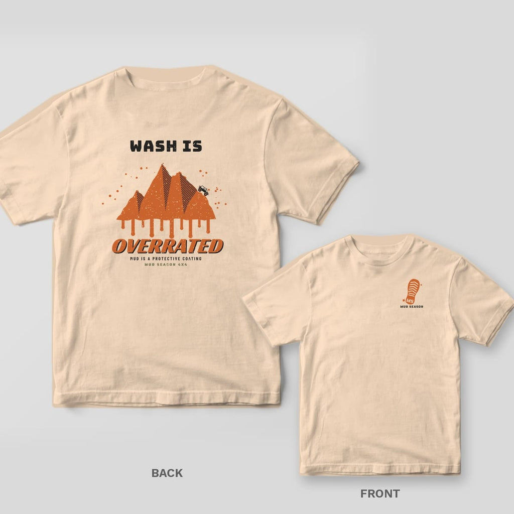 Ivory Comfort Colors 1717 tee shown back and front: mountain range made of dripping mud with a tiny rig and Wash Is Overrated text on the back, muddy boot print logo with MS in the tread on the left chest