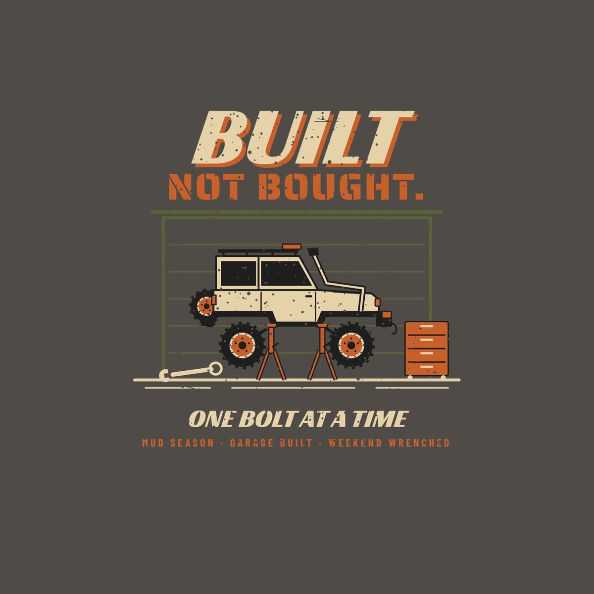 Close-up of the full back artwork: a 4x4 raised on jack stands beside a toolbox, with Built Not Bought and One Bolt at a Time, shown flat on a pepper background.