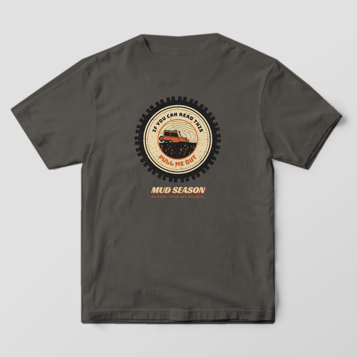 Back of a pepper Comfort Colors 1717 T-shirt printed with a spare tire cover reading If You Can Read This Pull Me Out around a 4x4 stuck in mud.
