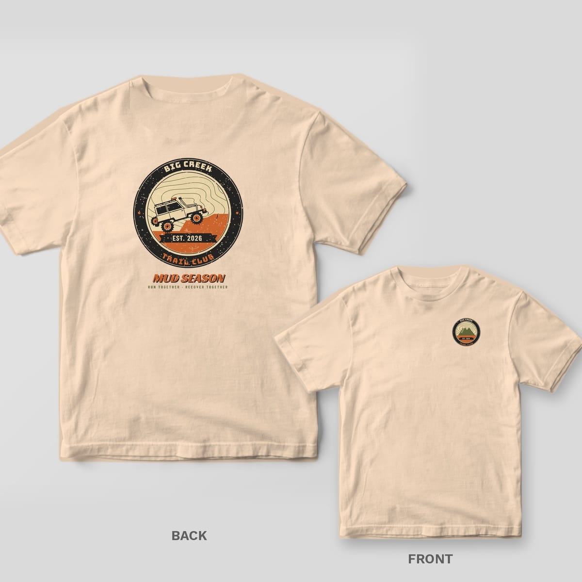 Back and front of an ivory Comfort Colors T-shirt; the back shows a personalized trail club circle badge with a 4x4 climbing a ledge, the front has a small matching badge.