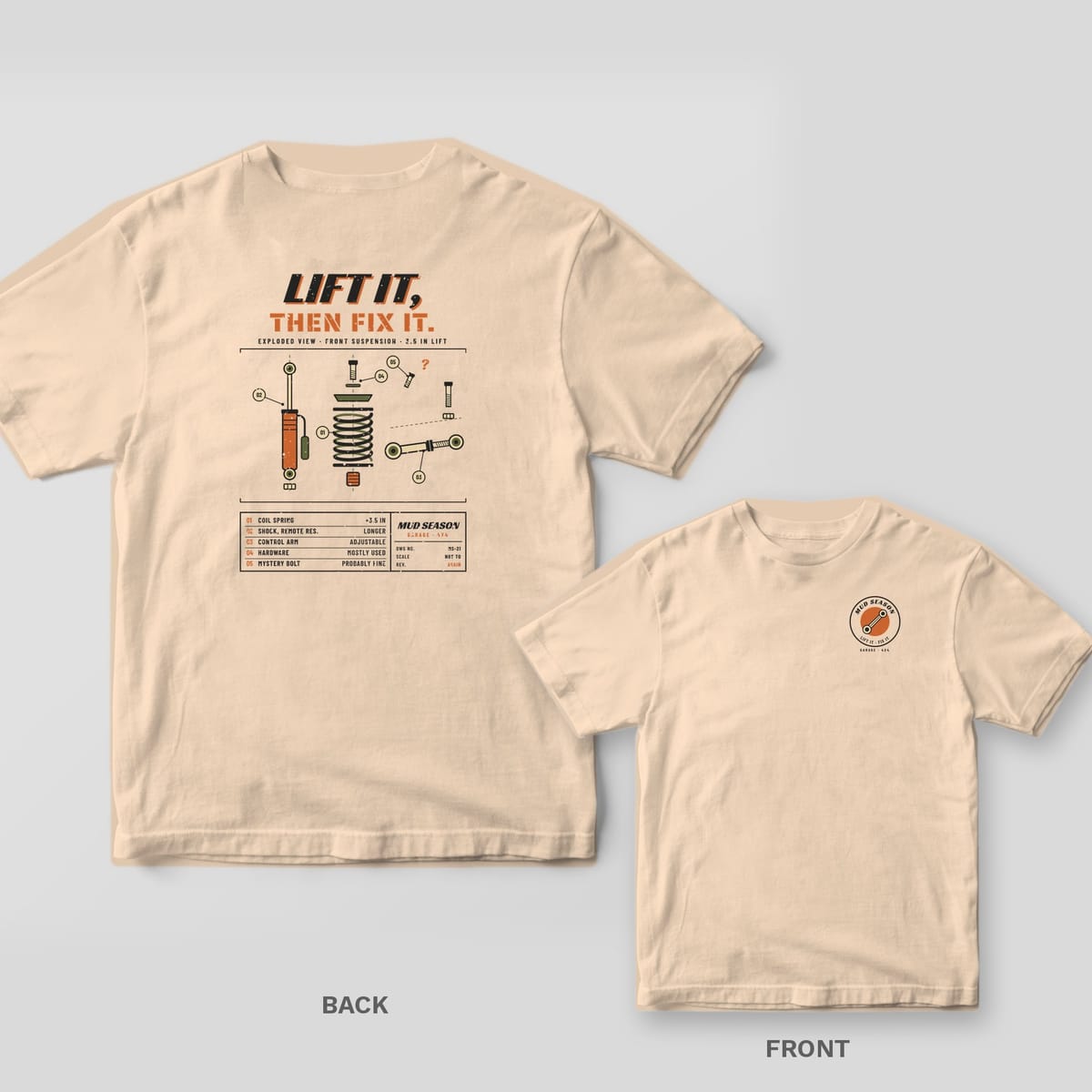 Ivory Comfort Colors 1717 tee shown back and front: exploded diagram of a suspension lift kit with callouts and Lift It, Then Fix It headline on the back, wrench badge reading Mud Season Lift It Fix It on the left chest