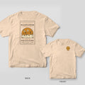Back and front of a ivory Comfort Colors T-shirt; the back shows a vintage wildflower seed packet reading plant for the pollinators, the front has a small left-chest print.
