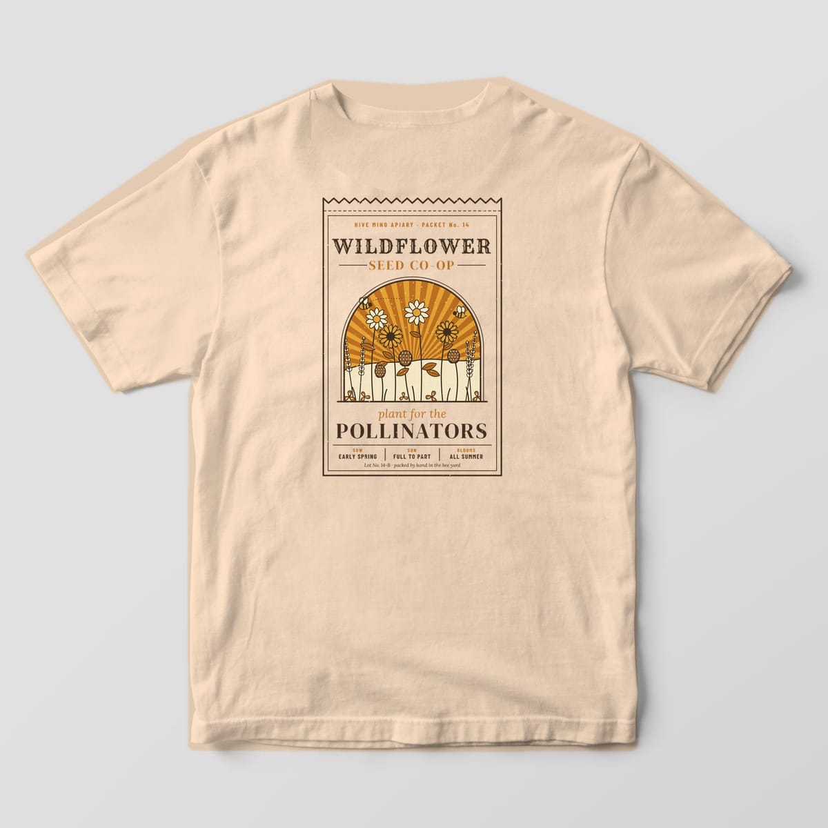 Back of a ivory Comfort Colors 1717 T-shirt printed with a vintage wildflower seed packet reading plant for the pollinators.