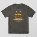 Front of a pepper Comfort Colors T-shirt with a full-front print of a large honey bee over clover and lavender with a Save The Bees ribbon.