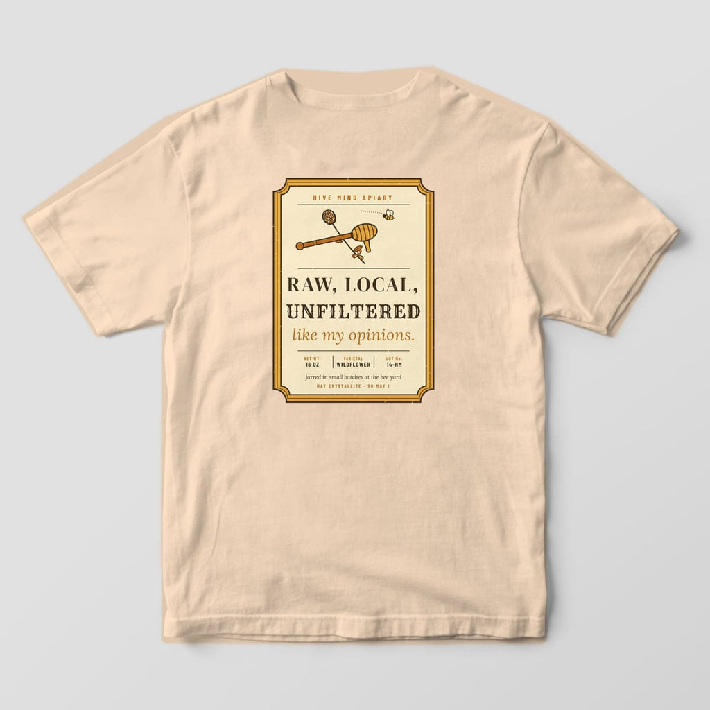 Back of a ivory Comfort Colors 1717 T-shirt printed with a vintage honey label reading Raw, Local, Unfiltered, like my opinions.