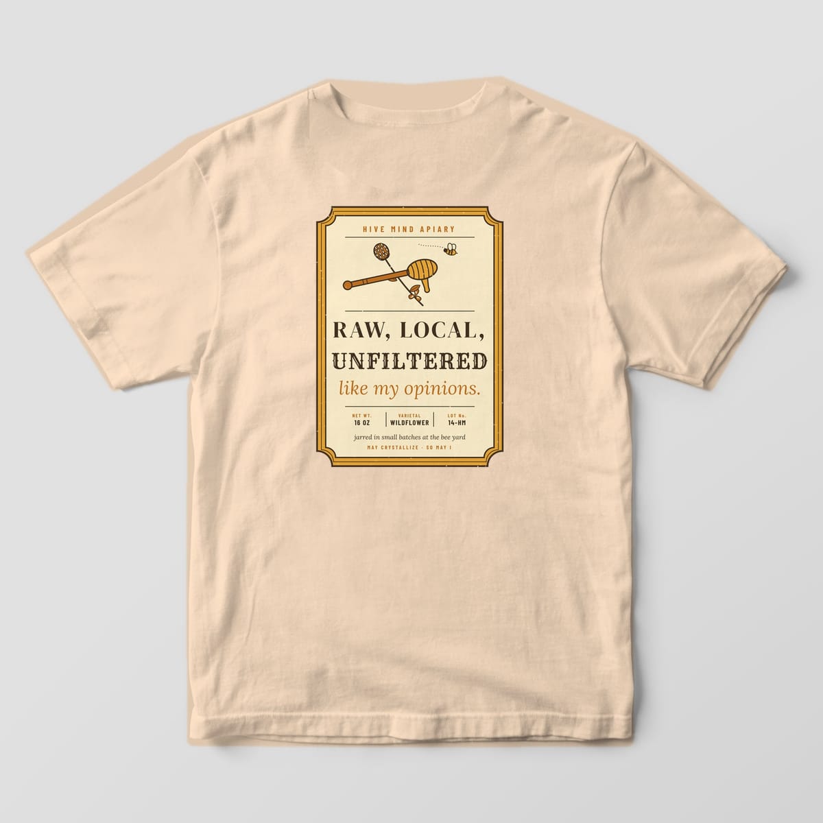 Back of a ivory Comfort Colors 1717 T-shirt printed with a vintage honey label reading Raw, Local, Unfiltered, like my opinions.