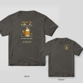Back and front of a pepper Comfort Colors T-shirt; the back shows an engraved bee smoker with curling smoke and the words Smoke 'Em If You Got 'Em, the front has a small round bee smoker badge on the left chest.