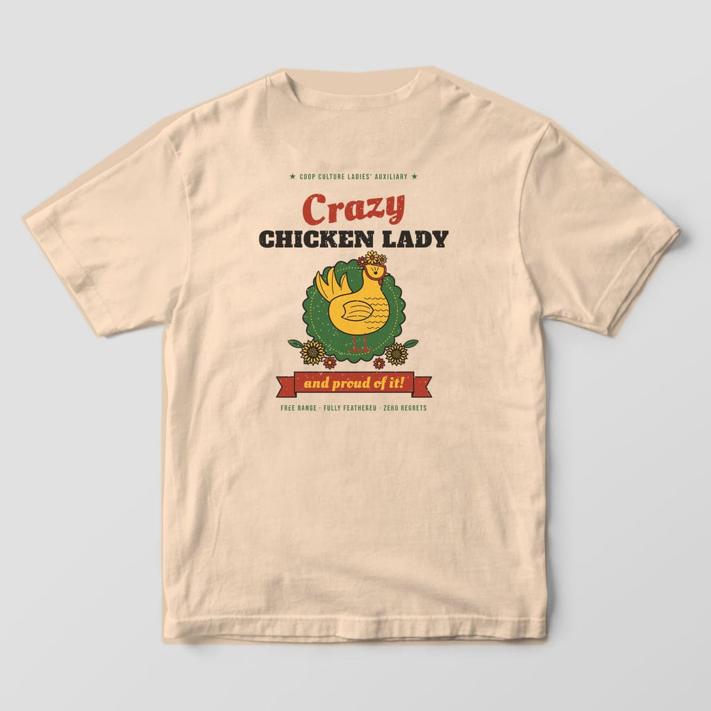Back of an ivory Comfort Colors 1717 tee with a Crazy Chicken Lady hen in cat-eye glasses, sunflowers and an And Proud Of It banner.