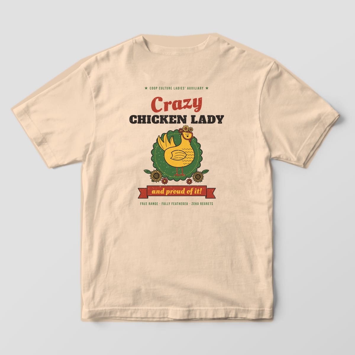 Back of an ivory Comfort Colors 1717 tee with a Crazy Chicken Lady hen in cat-eye glasses, sunflowers and an And Proud Of It banner.