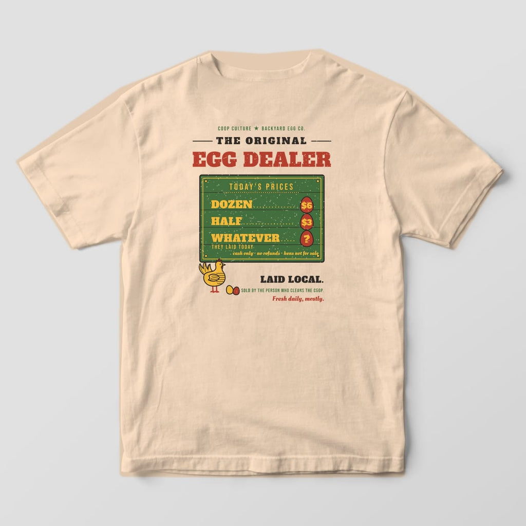 Back of an ivory Comfort Colors 1717 tee with The Original Egg Dealer price board listing Dozen, Half and Whatever They Laid.