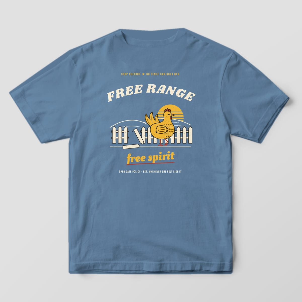 Back of a blue jean Comfort Colors 1717 tee with the Free Range Free Spirit hen, broken fence and retro sunset print.