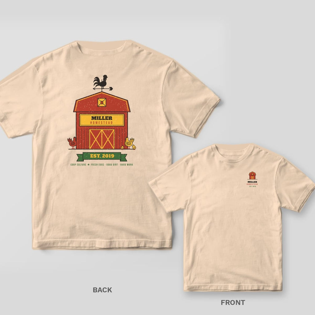 Ivory tee shown back and front: back has a red barn with a rooster weathervane and Miller Homestead Est. 2019; front has a small barn with the same name.