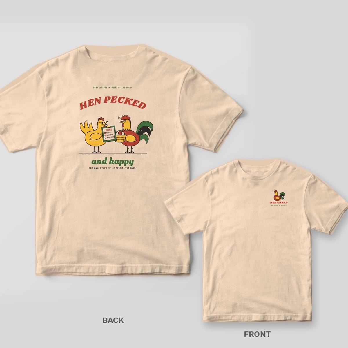 Ivory Comfort Colors tee shown back and front: back has a hen with a chore list and a rooster holding eggs under Hen Pecked And Happy; front has a small rooster.