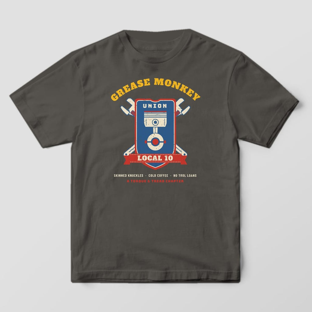 Pepper Comfort Colors tee with a full-front print: Grease Monkey Union Local 10 shield with a piston and crossed monkey wrenches.
