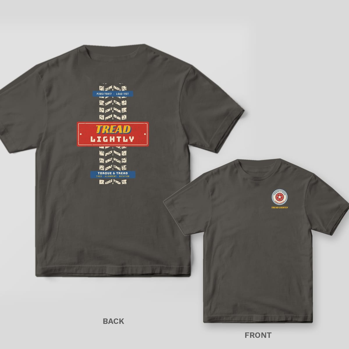 Pepper Comfort Colors tee shown back and front: a long tire tread stripe with a Tread Lightly plate on the back and a small tire with a red wheel on the chest.