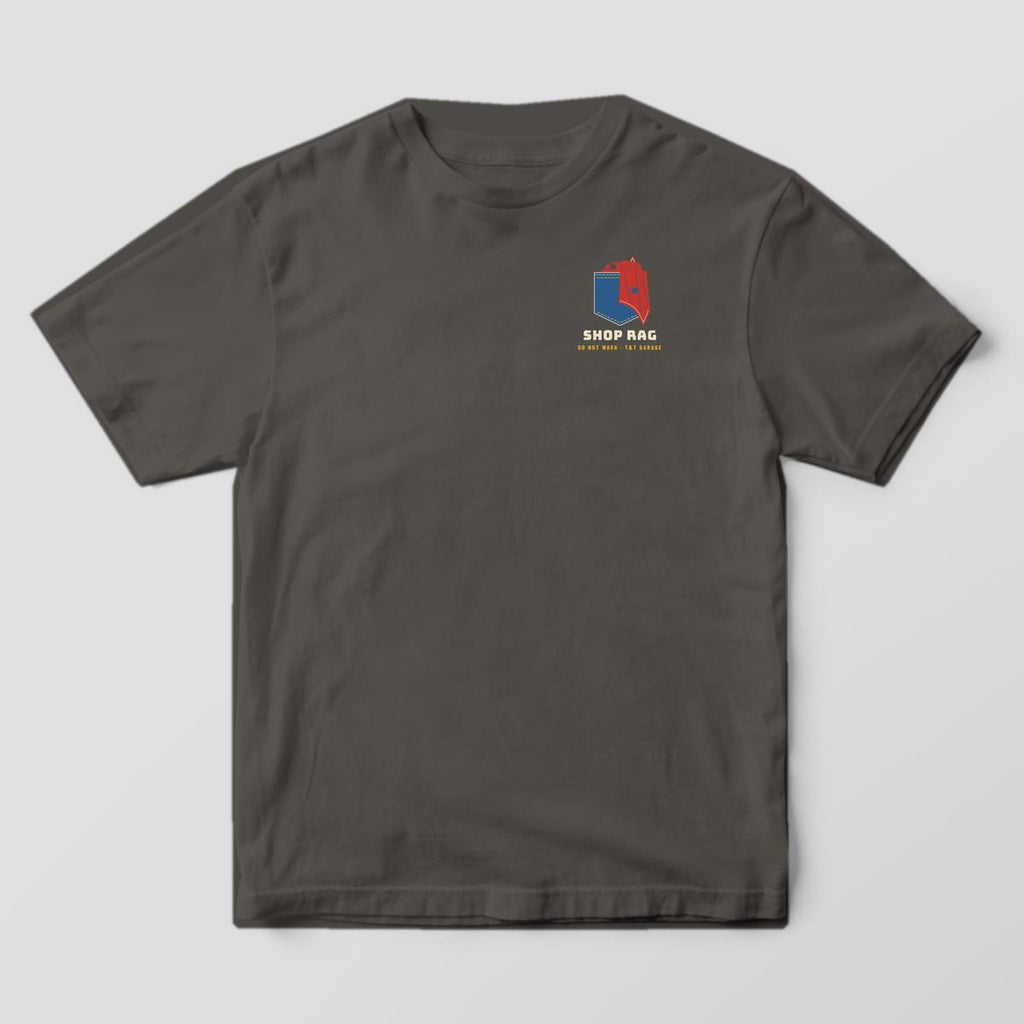 Front of a Pepper Comfort Colors 1717 tee with a small denim pocket with a red shop rag and the words Shop Rag on the left chest.