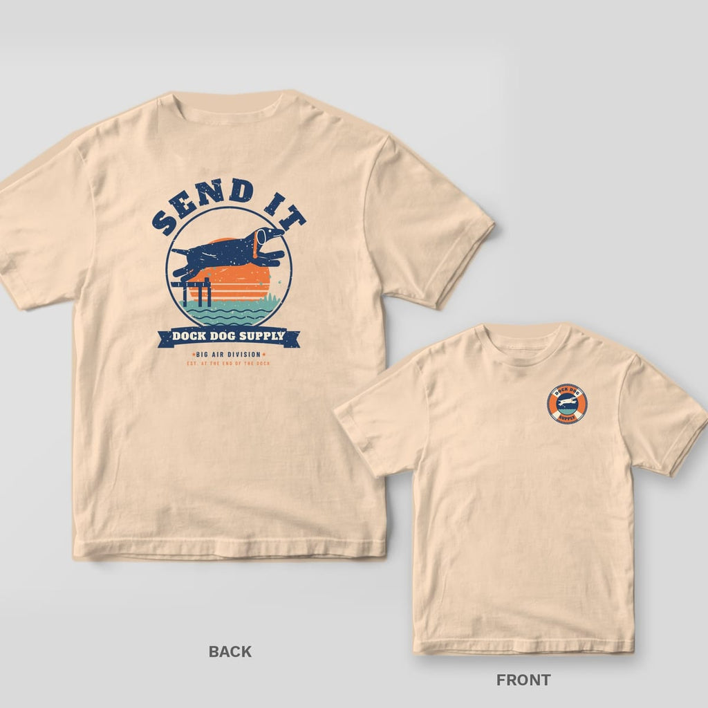 Ivory tee with a leaping lab over a retro sunset and Send It on the back, small life-ring dog badge on the front chest